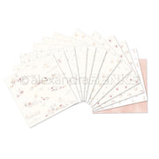 Ein Fächerarrangement der pastellfarbenen Dekorationspapiere von Alexandra Renke mit zarten Mustern - perfekt, um die Kreativität anzuregen oder Ihre Bündel und Sammlungen zu verschönern.