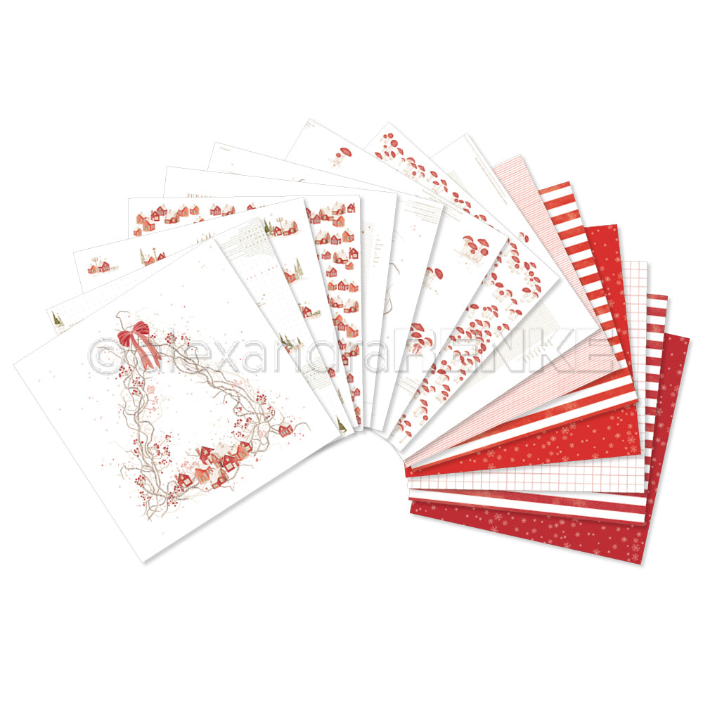 Eine fächerförmige Präsentation der Bastelpapiere aus dem „Kreativität Bundle“ zum Thema Weihnachten mit filigranen rot-weißen Mustern – als Inspiration für Ihr nächstes Projekt.