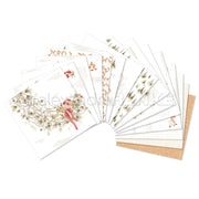 Eine fächerförmig angeordnete Kollektion dekorativer Briefpapiere mit Illustrationen zum Thema Winter und Weihnachten – ideal als Paket voller kreativer Inspiration.