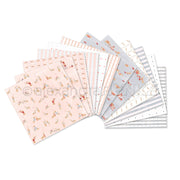 Eine Kollektion gemusterter Papierbögen mit Dackeln, Herzen, Streifen und Punkten.