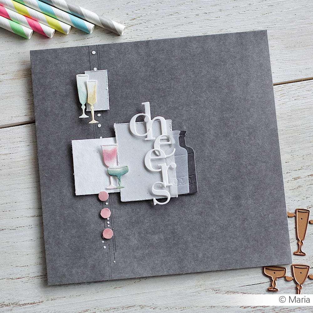 Handgemachte Grußkarte von Alexandra Renke mit "Prost"-Text, Sektgläsern aus einer Motivstanze und pastellfarbenen Punkten auf dunkelgrauem Hintergrund.