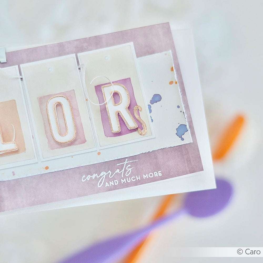 Eine pastellfarbene Karte von Alexandra Renke mit dem Schriftzug "LORS" in großen Buchstaben auf einem sanften lilafarbenen Hintergrund - ideal zum Kombinieren mit Ihren Lieblingsstempeln oder Photopolymer-Designs.