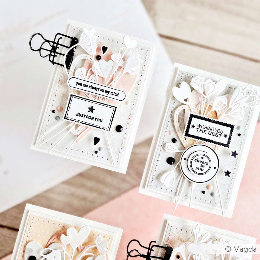 Die handgefertigten Karten von Alexandra Renke zeigen geschichtete Papierherzen, Blätter und aufmunternde Botschaften in sanften Neutral- und Rot-Tönen - ideal, um Inspiration zu vermitteln oder Ihre Kollektionen zu verschönern.