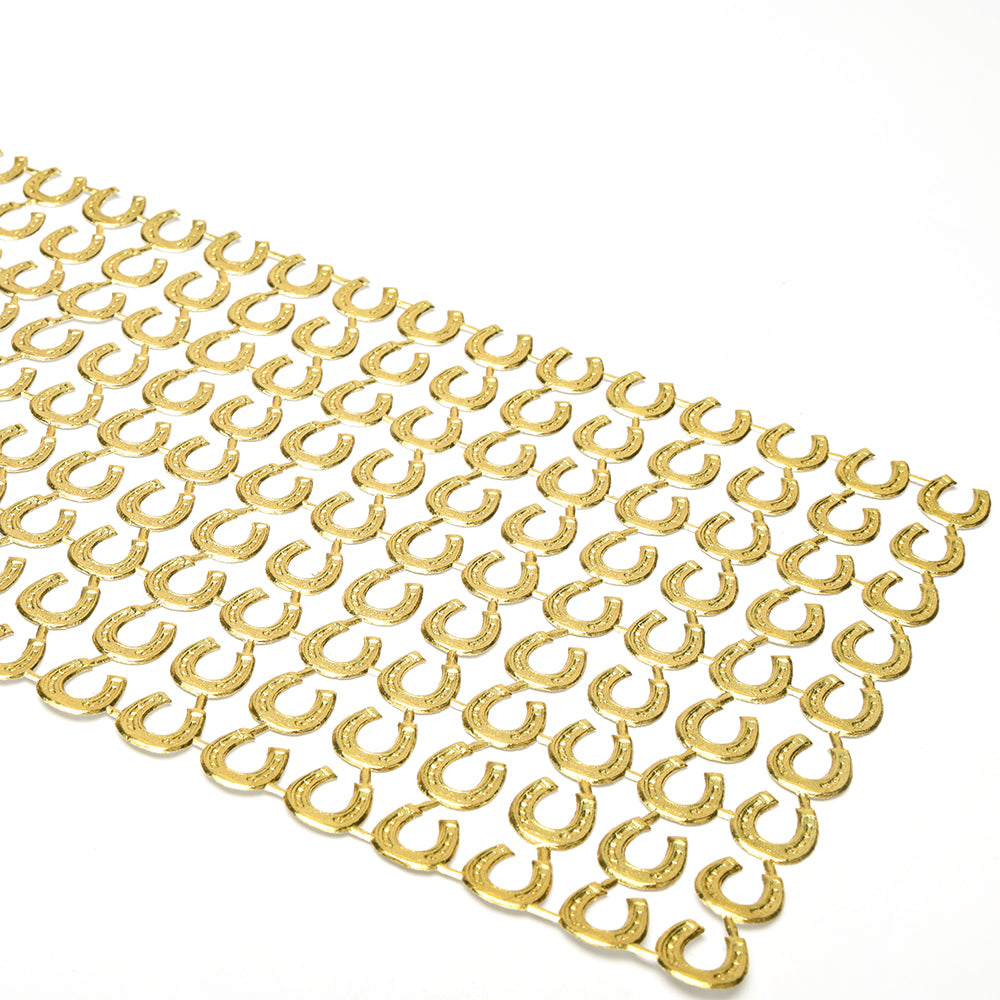 Ein Bogen mit goldenen Hufeisenmustern auf Weiß von ☆-ideal für Papierarbeit oder als elegante Dekoelemente in Ihren kreativen Projekten.