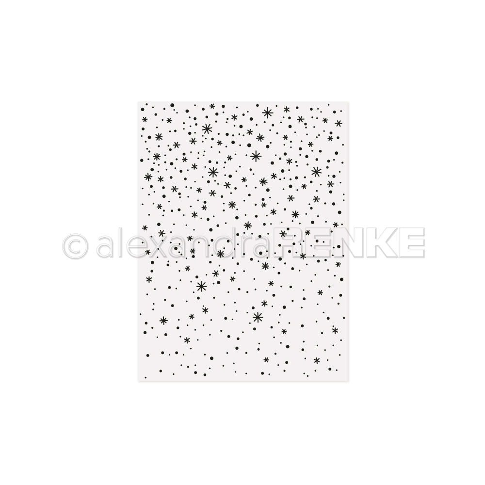 Weißes Blatt mit einem verstreuten Muster aus schwarzen Sternen und Punkten in verschiedenen Größen, die mit dem Alexandra Renke Embossing Folder geprägt wurden, um Struktur und Dimension zu erzielen.