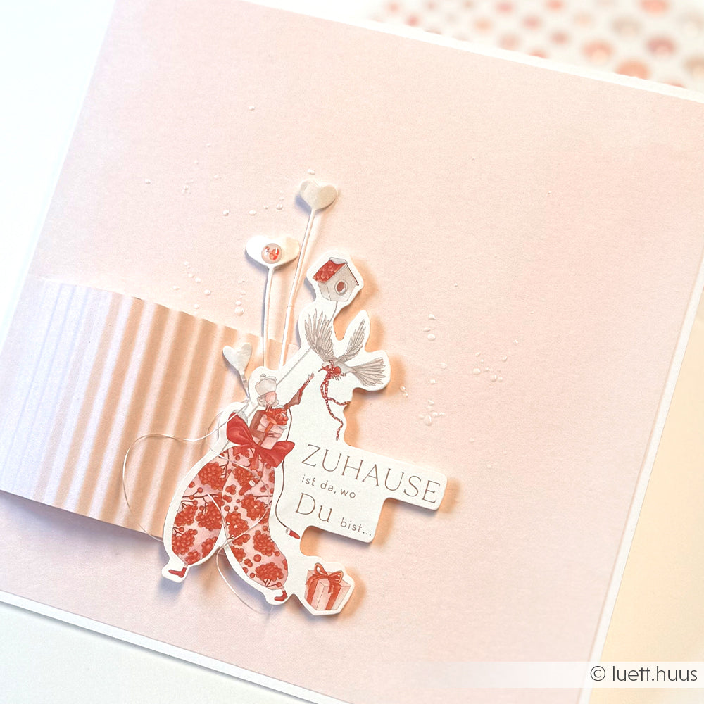 Alexandra Renke Grußkarte mit einem Blumenclown, Luftballons und deutschem Text: Zuhause ist da, wo Du bist. Ideal für Papertie-Projekte oder als charmante Ephemera für Ihre Sammlung.