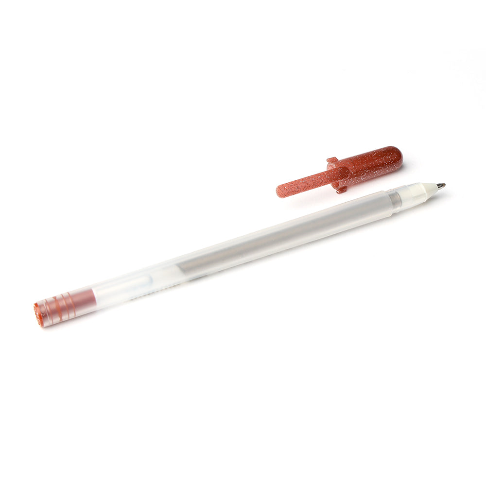 Rico Design Klarer Gelstift mit roter Kappe und rotem Ende, mit glitzernden Elementen, abgebildet auf weißem Hintergrund, ohne Kappe.