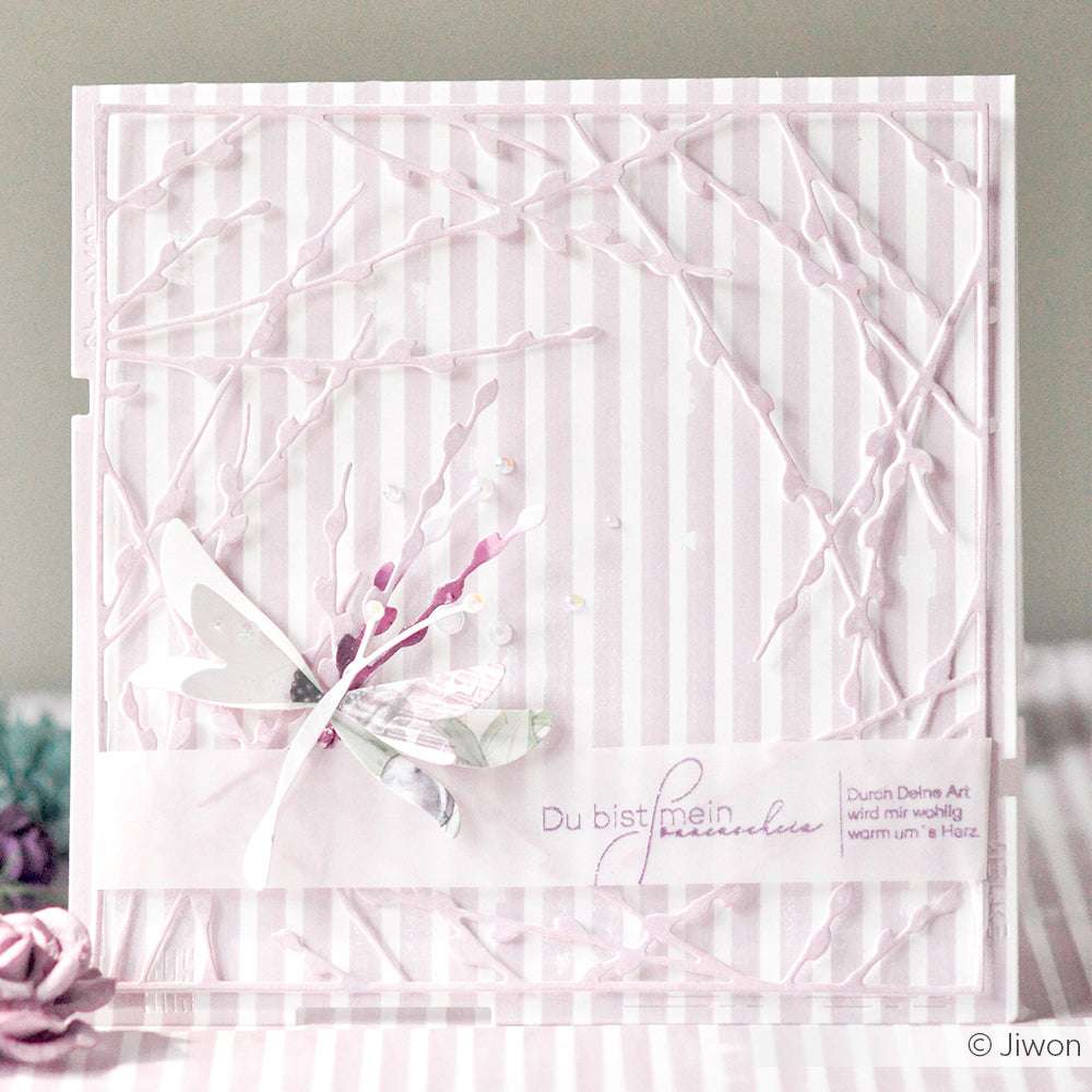 Handgefertigte Karte von Alexandra Renke mit pastellfarbenen Streifen, einem 3D-Schmetterling und Zweigakzenten aus Designpapieren unter Verwendung der Motivstanze Weidenkaetzchenrahmen mit deutschem Text.