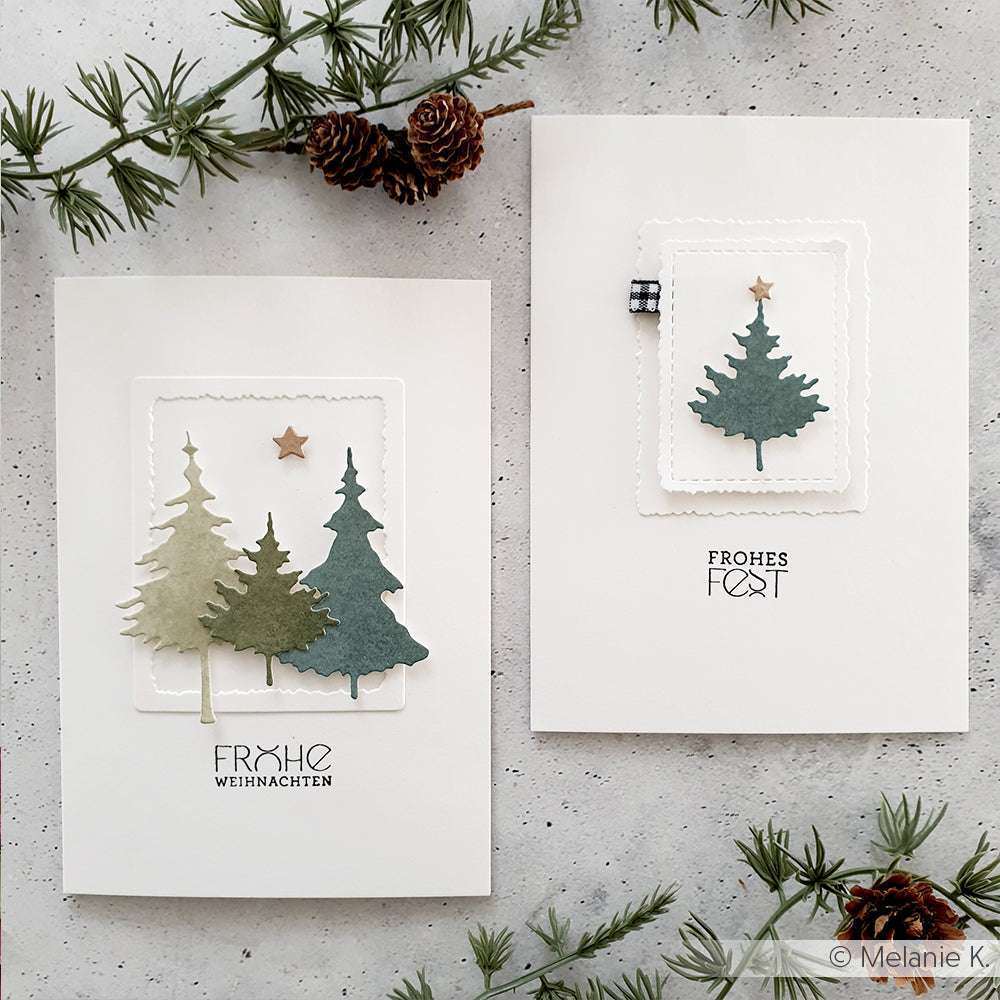 Zwei minimalistische Weihnachtskarten von Alexandra Renke, hergestellt mit 200g Designpapier und Motivstanze Tannen Trio, zeigen Baumausschnitte, Tannenzweige und die Texte Frohes Fest" und Frohe Weihnachten".