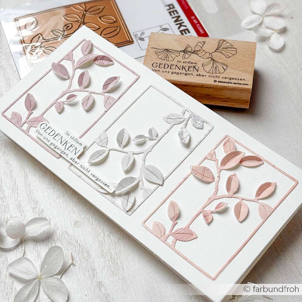 Eine handgefertigte Beileidskarte von Alexandra Renke mit geprägten Blättern, deutschem Text, PAPPcut®ies-Akzenten, Stempeln und Papierblumen, hergestellt mit der Motivstanze Zweig im Rahmen.