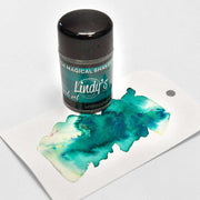 Eine Flasche Lindy's Stamp Gang Magical Shaker enthält hochpigmentiertes Pulver, das als aquarellfarbenes Muster auf einem weißen Etikett abgebildet ist.