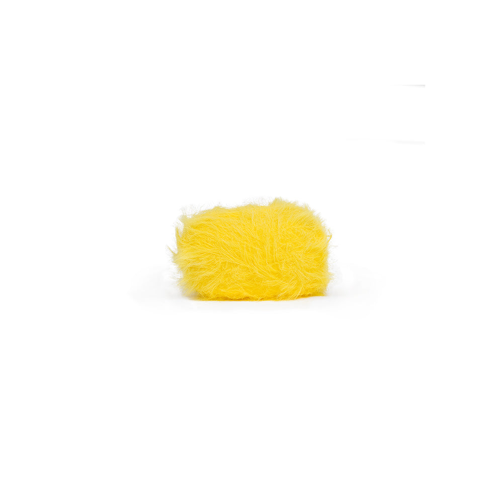 Ein kleiner, runder, gelber Pompon, der flauschig aussieht.