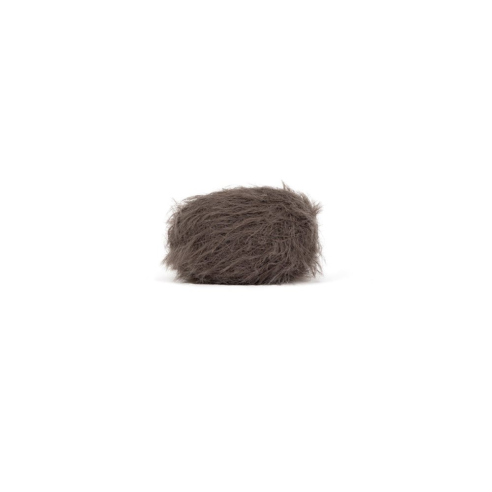 Ein flauschiger, grauer Mikrofonwindschutz im Fellart-Look.