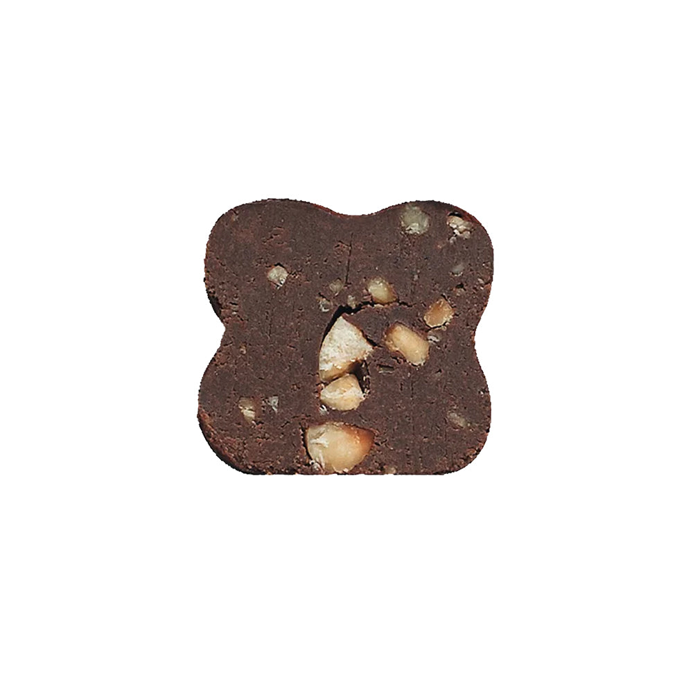 Kleeblattförmiges Tartufo dolce nero-Schokoladen-Nuss-Plätzchen.