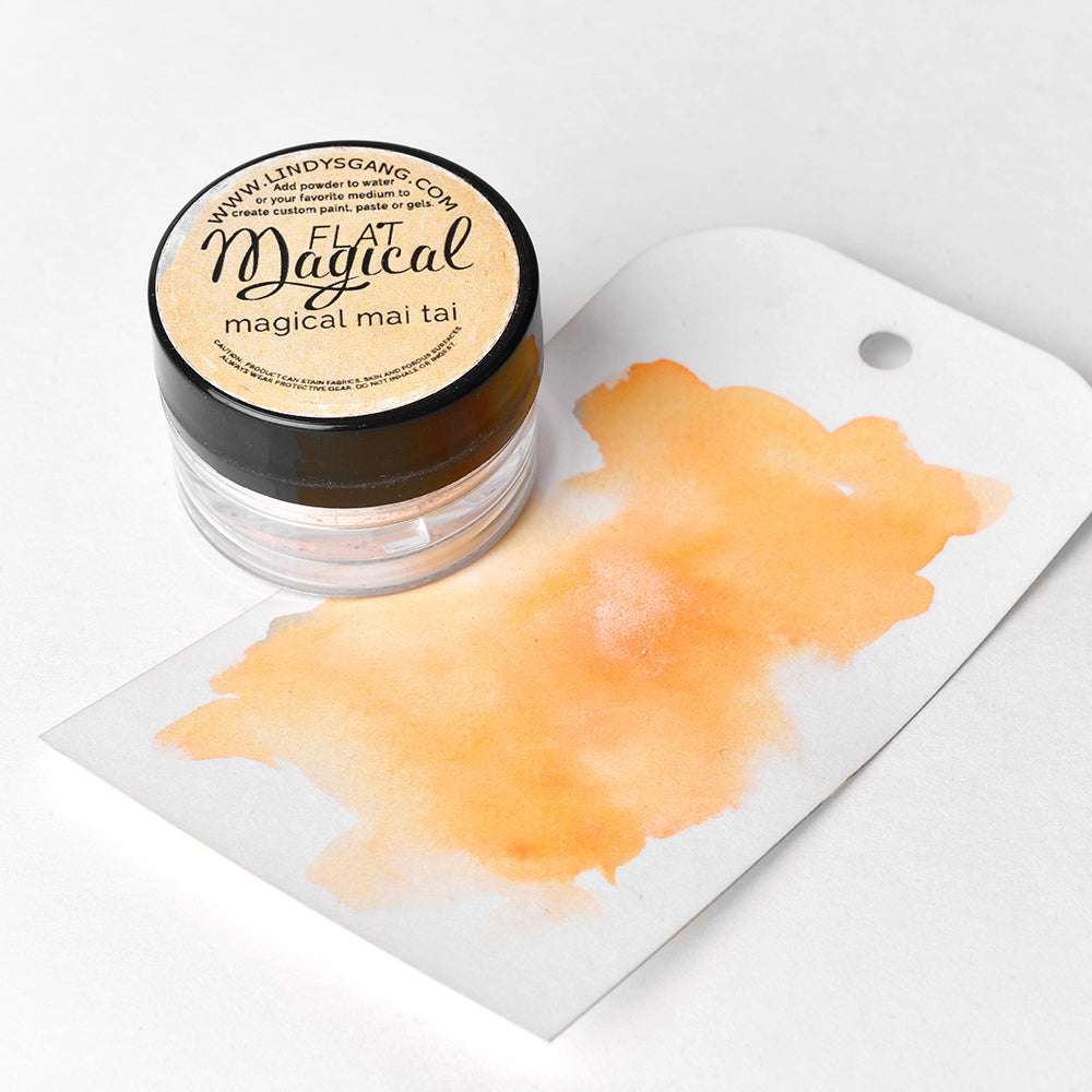 Kleines Döschen von Lindy's Stamp Gang Magical Powder in Mai Tai, hochpigmentiert, mit einem orangefarbenen Muster auf einem weißen Anhänger - ideal für kreative Farbmischungen.