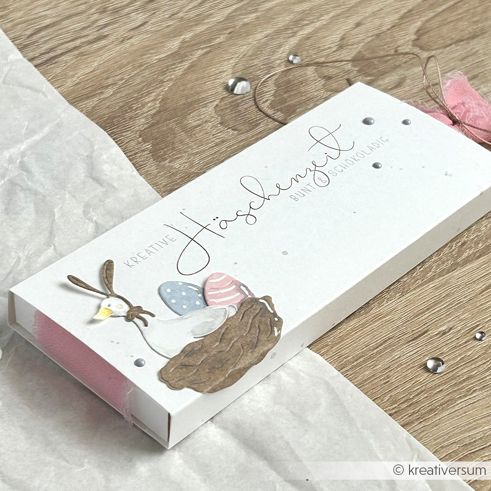 Rechteckige Oster-Geschenkbox von Alexandra Renke mit Ente, Eiern und Nest auf Holz - ideal für Fans von Gans im Osterfieber oder Liebhaber von kreativen Motivstanze- und Stanzsystemen.