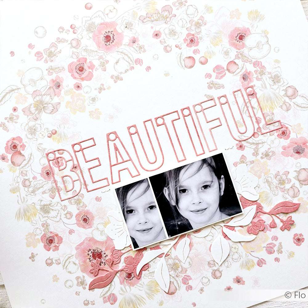 Scrapbook-Seite mit SCHÖN in fetten, schwarz-weißen Kinderfotos, rosa Blumen und Alexandra Renkes Designpapier Apfelblüten-Kranz - die perfekte Inspiration für Grußkarten oder charmante Papierprojekte.