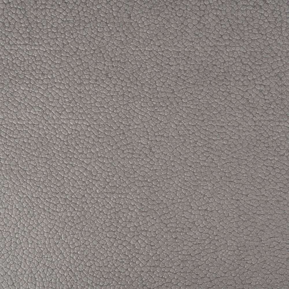 Nahaufnahme einer strukturierten grauen Oberfläche von ☆, die einen gleichmäßig gemusterten 3D-Effekt aufweist, der an geprägtes Papier oder kleine Kieselsteine erinnert.