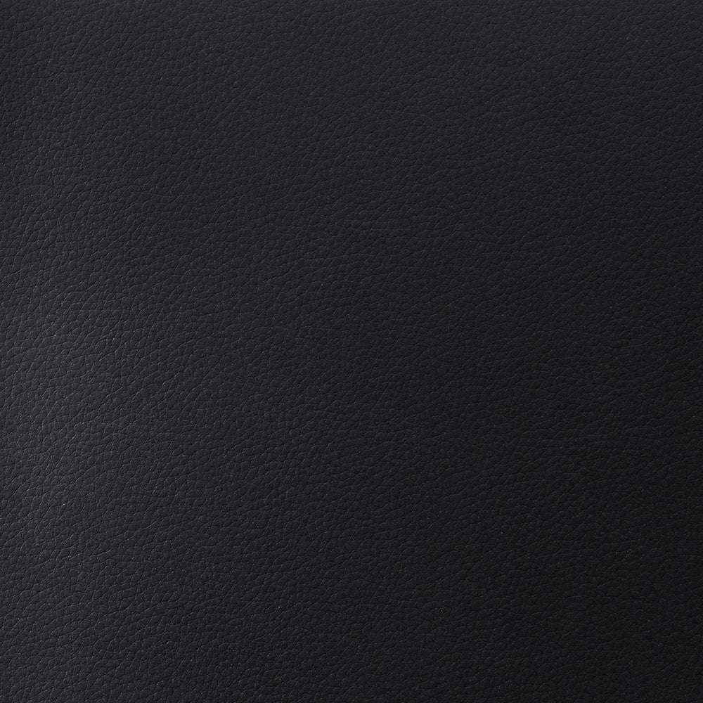 Nahaufnahme von schwarzem, strukturiertem Leder von ☆ mit feinen, subtilen Narbenmustern, die an hochwertiges Cardstock oder 3D-geprägtes Papier erinnern - perfekt, um jedem Bastelprojekt ein haptisches Element hinzuzufügen.