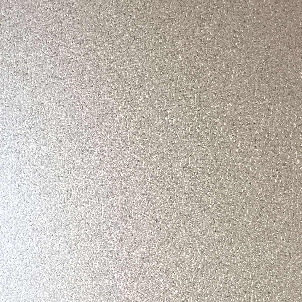 Nahaufnahme von ☆ hellbeigem strukturiertem Leder mit feiner und subtiler Narbung, die an 3D-geprägtes Papier oder hochwertigen Karton erinnert - perfekt für Ihr nächstes Bastelprojekt.