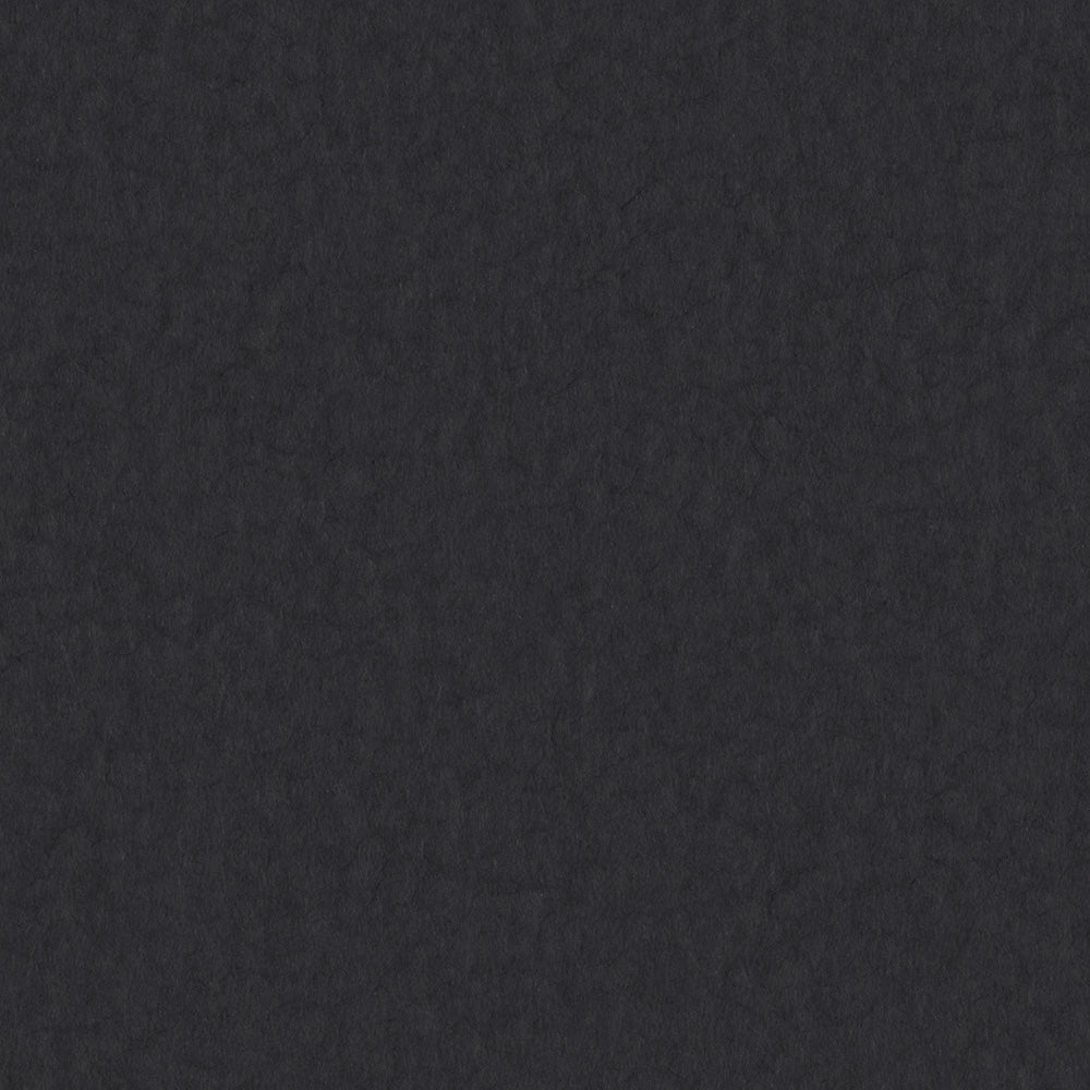 Eine dunkle, strukturierte Oberfläche mit unregelmäßigen Mustern, die an schwarzen Filz oder Tropfenpapier erinnert, wie es in ☆ Buchbinden vorkommt.