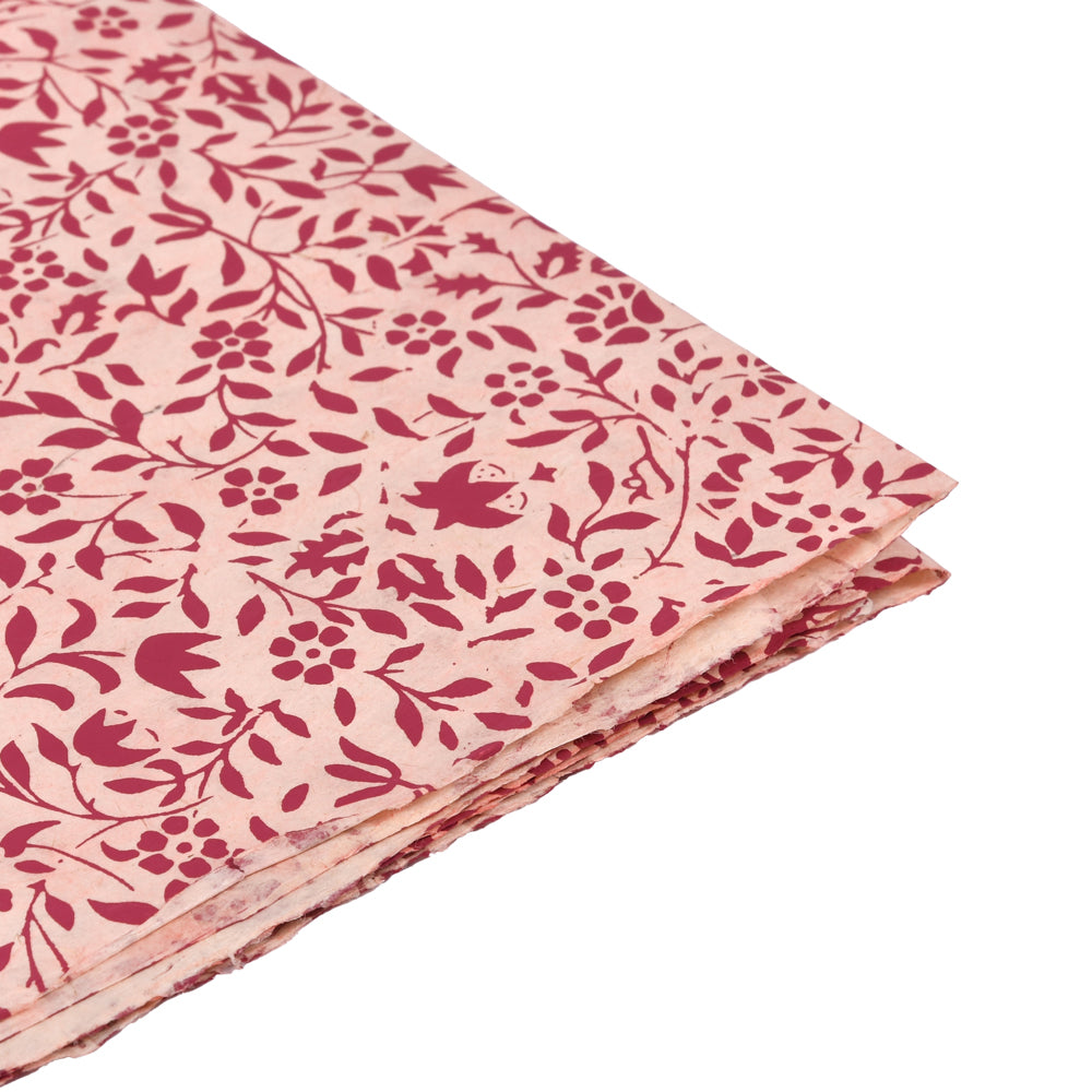 Stapel ☆ dekorativer Nepalpapierbögen mit rotem Blumen- und Vogelmuster auf hellrosa-ideal für Handarbeit oder Geschenke Verpacken.