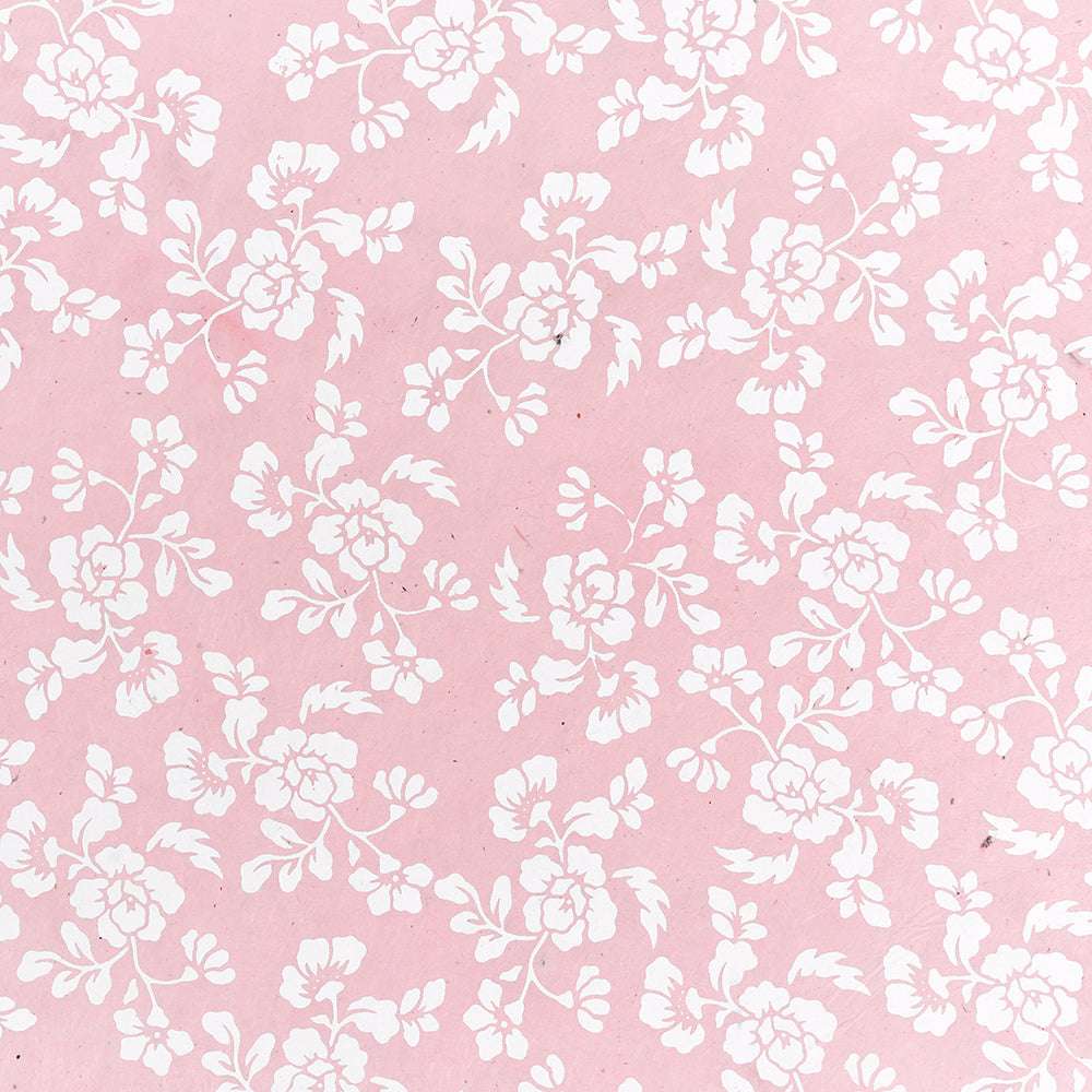 Das ☆ Nepalpapier mit seinem weißen Blumenmuster in Pastellrosa verleiht der Geschenkverpackung Eleganz - perfekt, um Ihre Geschenke stilvoll zu verpacken.