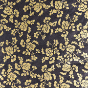 ☆ Goldenes Blütenmuster auf schwarzem Nepalpapier, verziert mit Zweigen, Blättern und Blüten - perfekt als nachhaltiges Geschenkpapier.