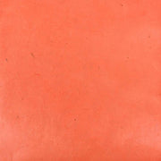 Orangefarbene strukturierte Oberfläche von ☆, hergestellt aus echtem Nepalpapier mit subtilen Markierungen und winzigen dunklen Flecken - eine originelle Option für Buchbinden oder Geschenke Verpacken.
