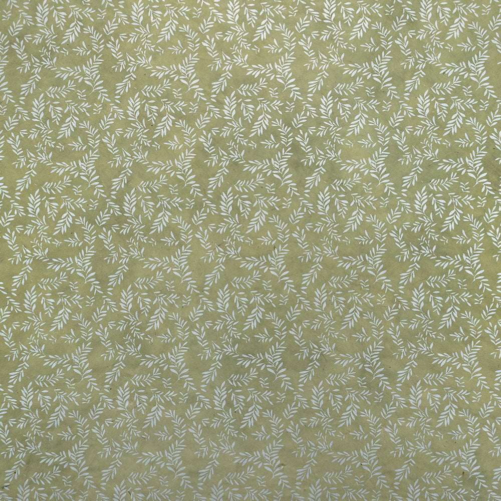 Olivgrünes Nepalpapier mit kleinen weißen Blattbüscheln in geometrischen Mustern - ideal zum Basteln oder Verpacken von Geschenken.