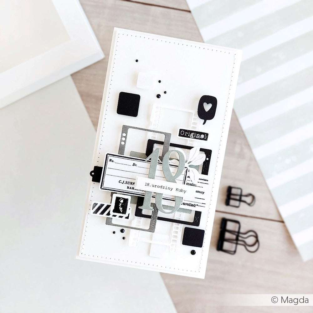 Eine handgefertigte schwarz-weiße Geburtstagskarte von Alexandra Renke mit geometrischen Formen, Filmstreifen, Motivstanze Dia Rahmen hochkant und der Zahl 18 in der Mitte.