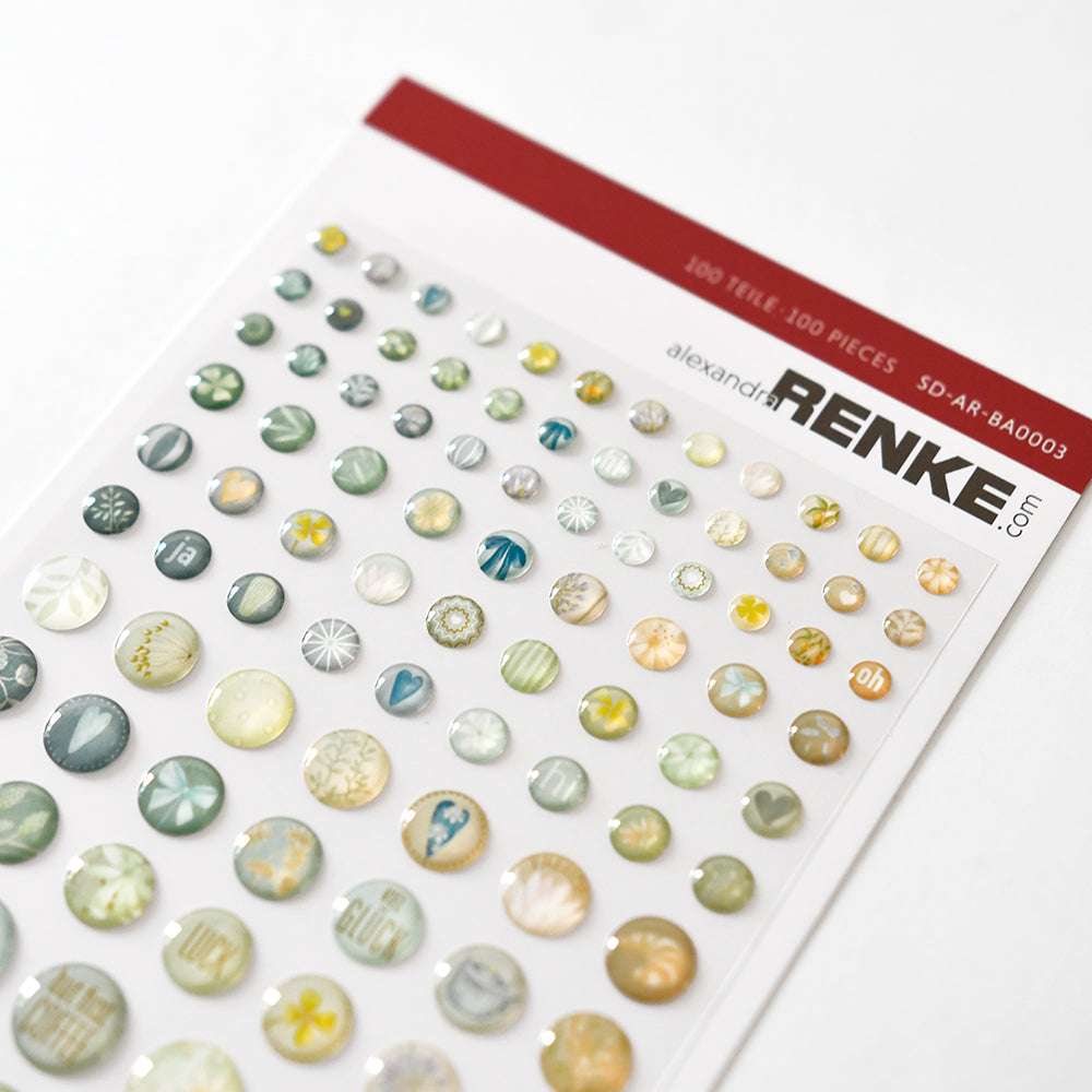 Bogen mit bunten Sticker-Punkten in verschiedenen Farben und Mustern für die kreative Kartengestaltung, von Alexandra Renke.