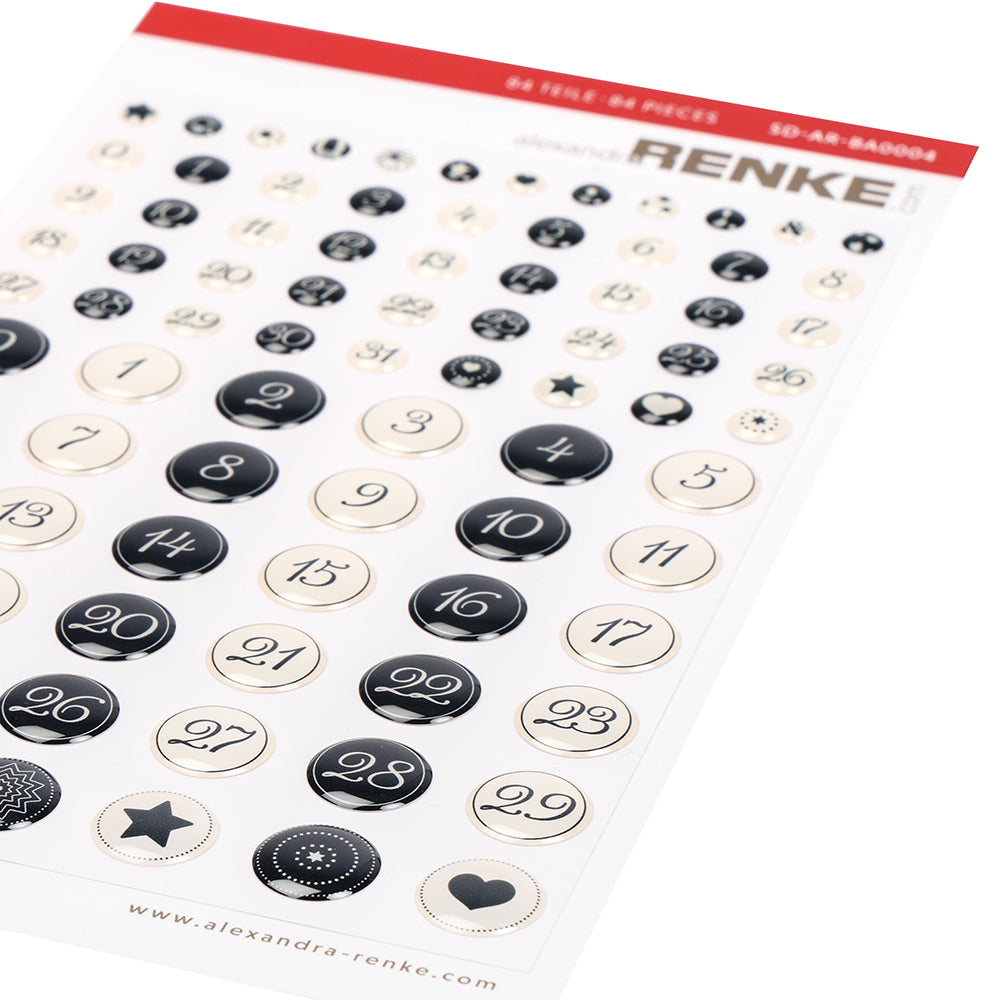 Ein Bogen Alexandra Renke kalligrafisch 1-31 Sticker Dots in schwarz und weiß, nummeriert 1-31 mit Stern- und Herzsymbolen - ideal für Planer oder Kartengestaltung.