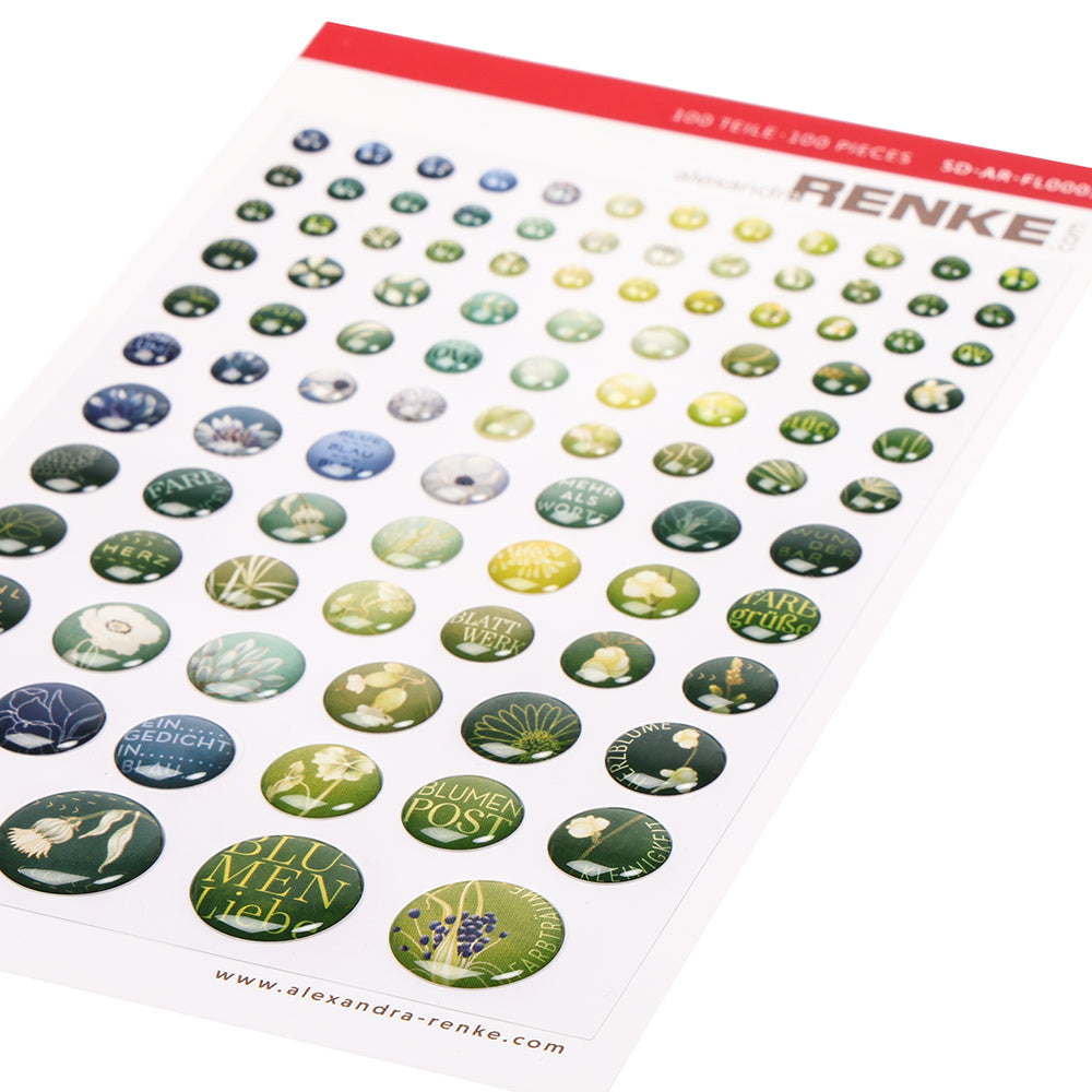 Ein Bogen runder grüner und weißer Blumensticker Dots von Alexandra Renke, die in Reihen auf weißem Hintergrund angeordnet sind - ideal für die Gestaltung von Karten oder um Ihren Bastelarbeiten einen floralen Touch zu verleihen.