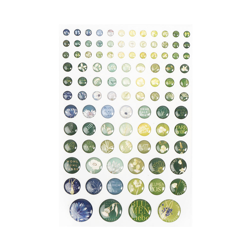 Ein Bogen Alexandra Renke runde Sticker Dots Blumenpost mit grünen und blauen Blumen und deutschen Wörtern - perfekt für Buchbindearbeiten oder um Ihren Projekten eine charmante Note zu verleihen.