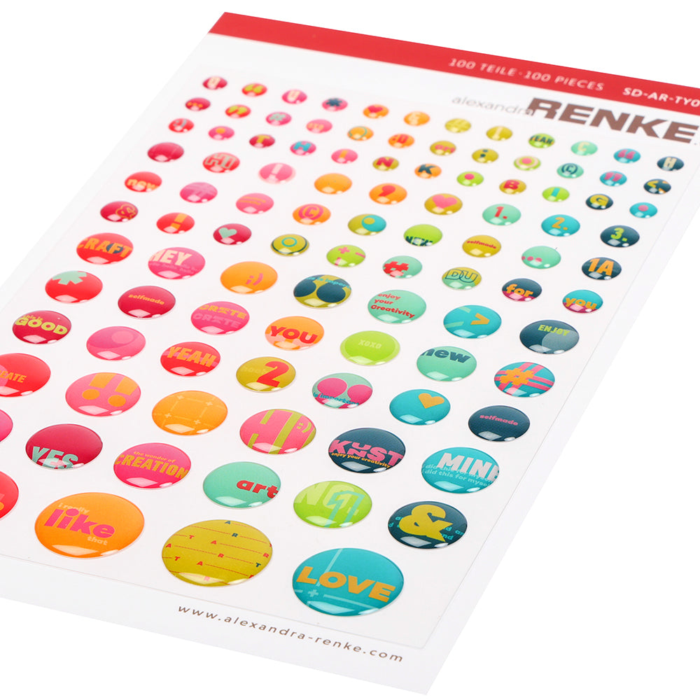 Ein Bogen mit bunten Sticker Dots von Alexandra Renke mit verschiedenen Wörtern und Symbolen auf weißem Hintergrund - ideal zum Verzieren oder für kreative Kartengestaltung.