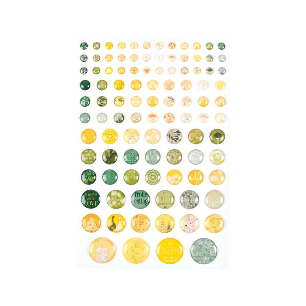 Ein Raster aus grünen und gelben Sticker Dots von Alexandra Renke in verschiedenen Mustern - ideal für Kartengestaltung oder kreative Projekte.