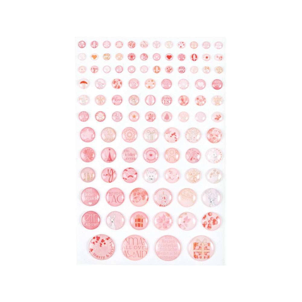 Bogen mit runden rosa Sticker Dots von Alexandra Renke, mit Rosa Schneegestöber-Mustern, Symbolen und Text. Perfekt für die Kartengestaltung; die Motive sind in übersichtlichen, größenabhängigen Reihen angeordnet.