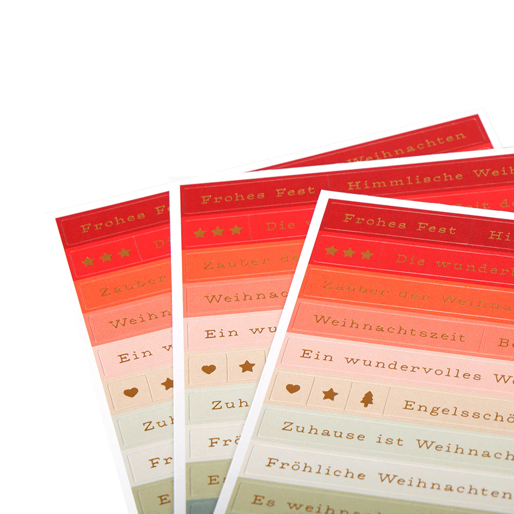 Bögen mit roten und beigen Alexandra Renke Sticker-Streifen mit deutschen Weihnachtsgrüßen und weihnachtlichen Symbolen wie Sternen und Bäumen - ideal zum Basteln von Karten und um Weihnachtszauber in Ihre Kreationen zu bringen.