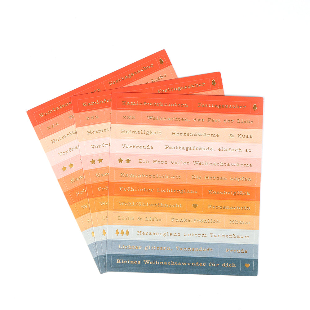 Vier Bögen mit weihnachtlichen Sticker-Streifen von Alexandra Renke mit deutschem Text und goldenen Akzenten - perfekt für Kartengestaltung und eine Wohlfühlweihnacht.