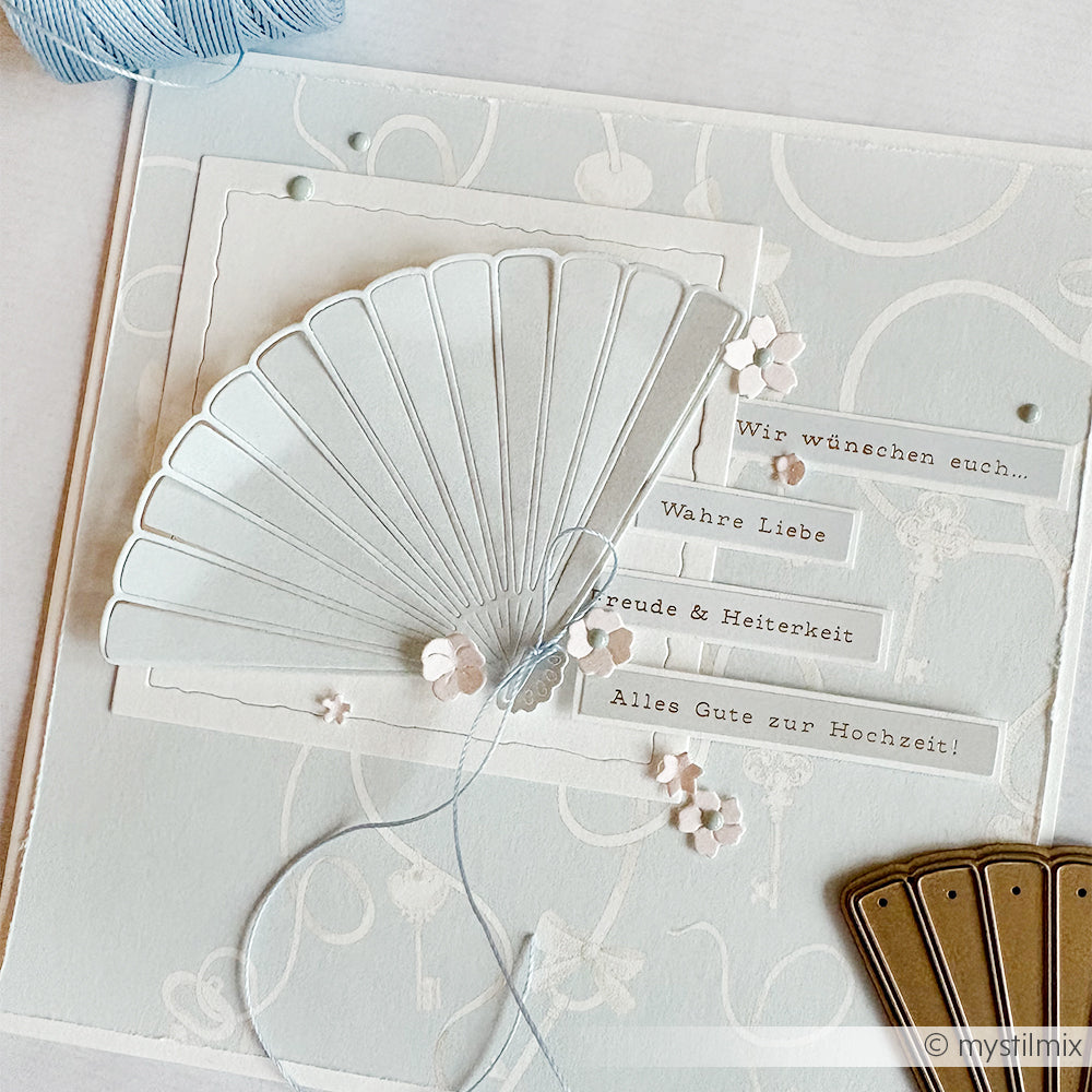 Handgemachte Hochzeitskarte von Alexandra Renke mit einem Papierfächer, kleinen Blumen und deutschen Wünschen für Liebe, Freude und Glück - ideal für kreative Kartengestaltung und zum Verzieren mit Sticker Hochzeitsbotschaften.