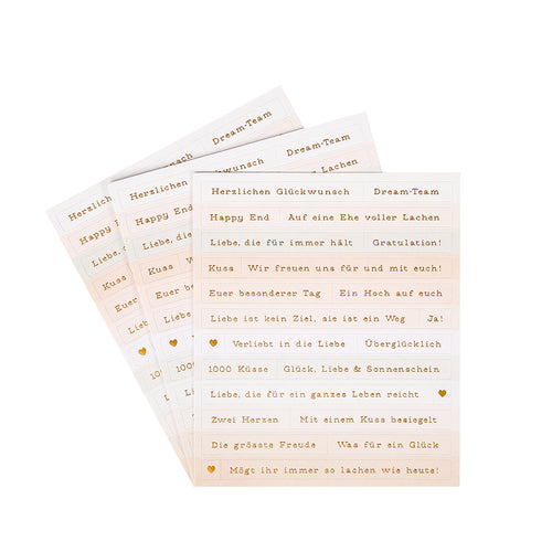 Vier Bögen der beigefarbenen Alexandra Renke Sticker Streifen sind mit deutschen und englischen Sprüchen in Gold versehen - ideal zum Basteln von Karten oder zum Hinzufügen stilvoller Sticker Hochzeitswünsche zu Ihren besonderen Karten.