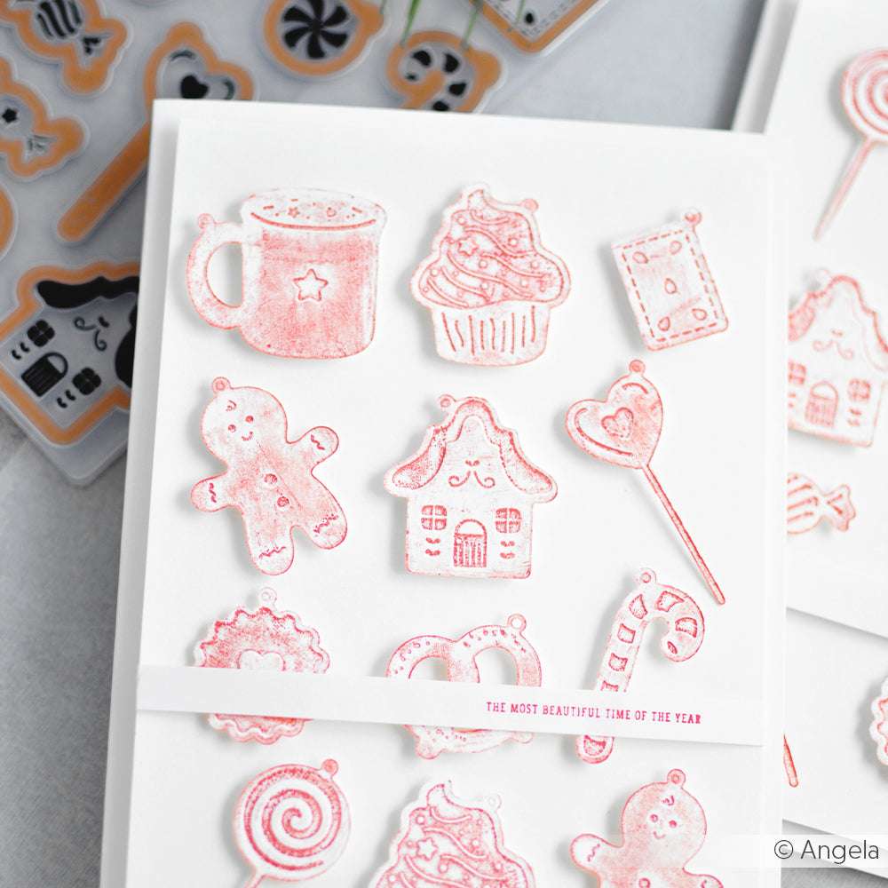 Verschiedene rot-weiße Weihnachtskeksaufkleber - Lebkuchen, Kakao und Süßigkeiten - passen perfekt zu den Ranger Barn Door Distress Oxide Stempelkissen Stempelfarbe auf weißem Hintergrund.