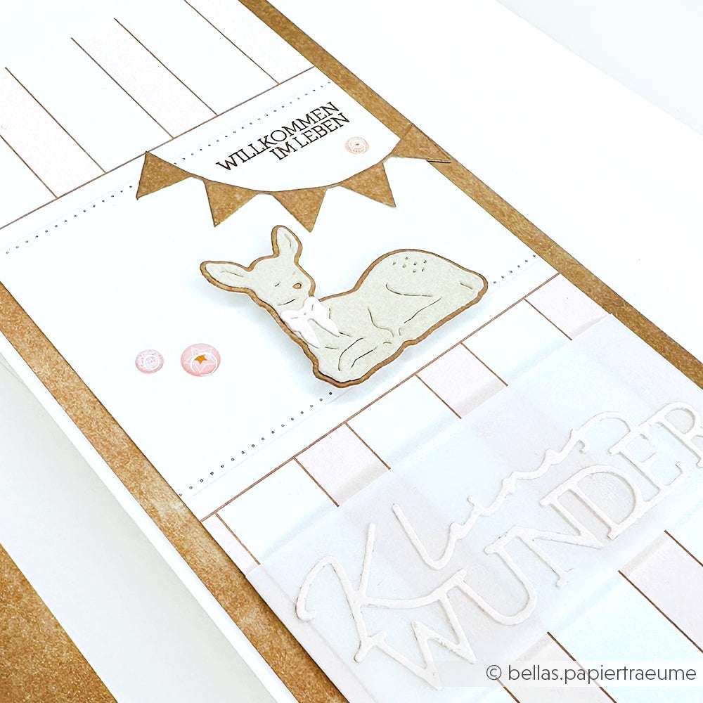 Handgefertigte Karte von Alexandra Renke mit Motivstanze Rehkitz, Banner "Willkommen im Leben" und geprägtem Text "Kleines Wunder" auf hochwertigen Designpapieren für ein elegantes Finish.