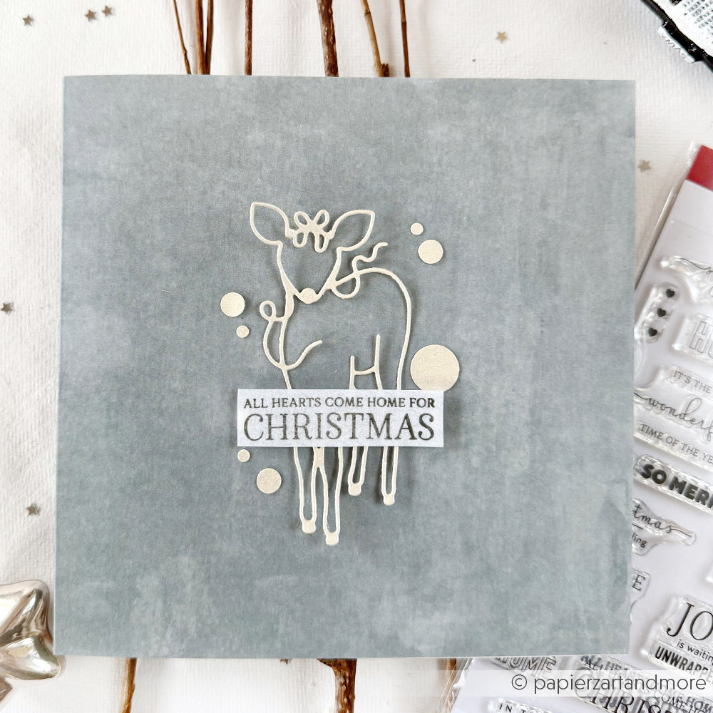 Handgefertigte Weihnachtskarte von Alexandra Renke mit minimalistischem Rentierdesign unter Verwendung von Motivstanze Feines Reh und hochwertigen Designpapieren, mit dem Text "All hearts come home for Christmas".