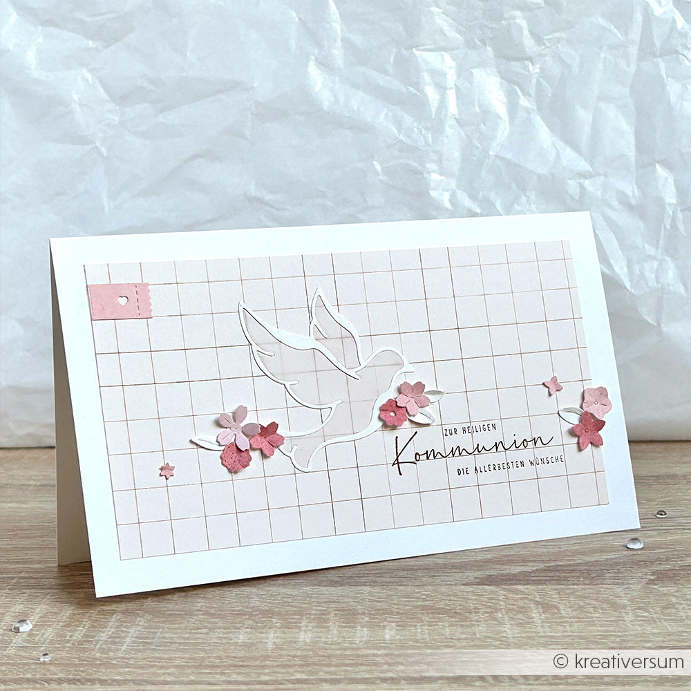 Grußkarte von Alexandra Renke mit einer Lineart Taube, rosa Blumen und Gitterhintergrund auf hochwertigem Designpapier; mit deutschen Kommunionswünschen.