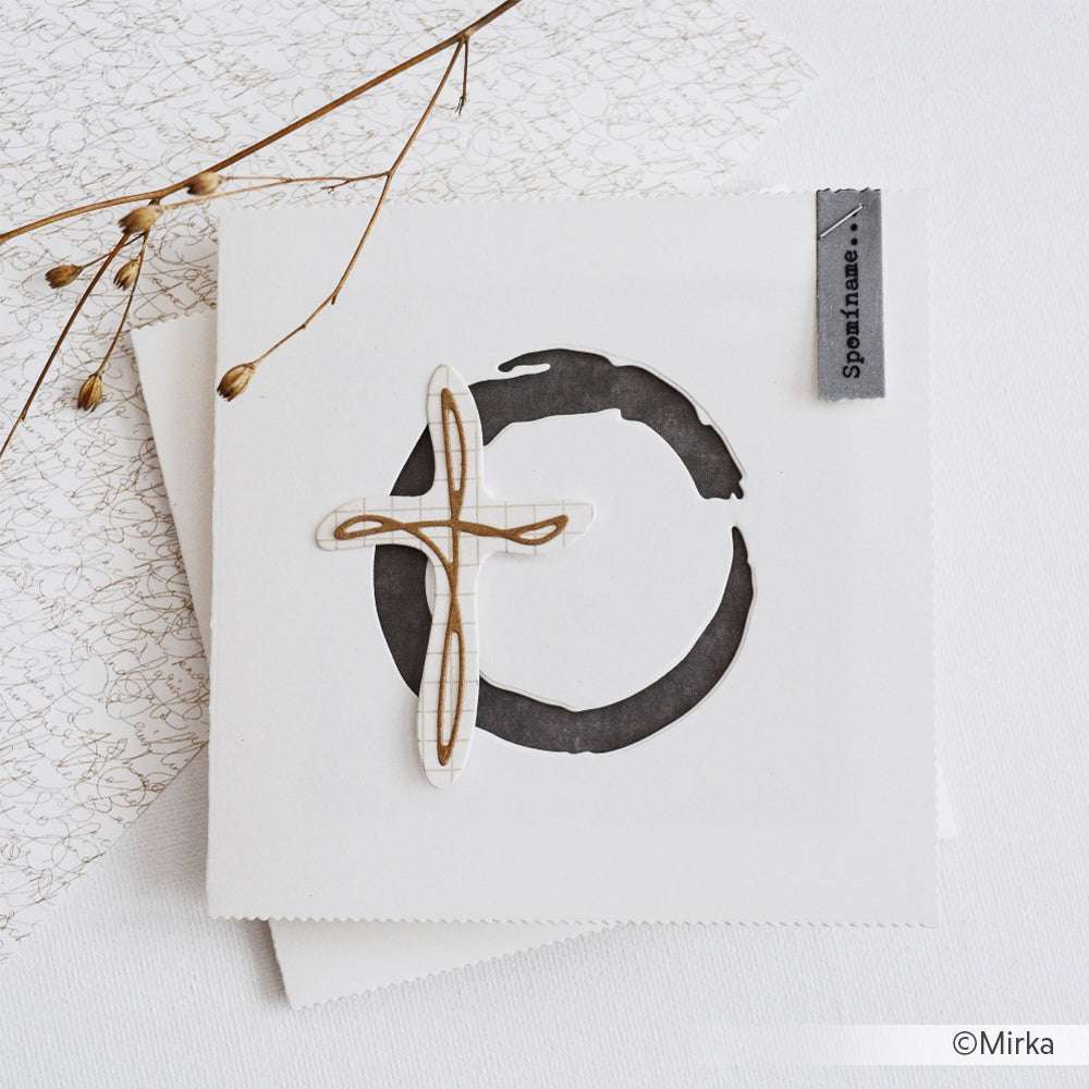 Minimalistische Karte von Alexandra Renke mit einem schwarzen Pinselstrichkreis, einem goldenen Kreuz, getrockneten Pflanzenstängeln und Designpapier-Akzenten auf weißem Papier.