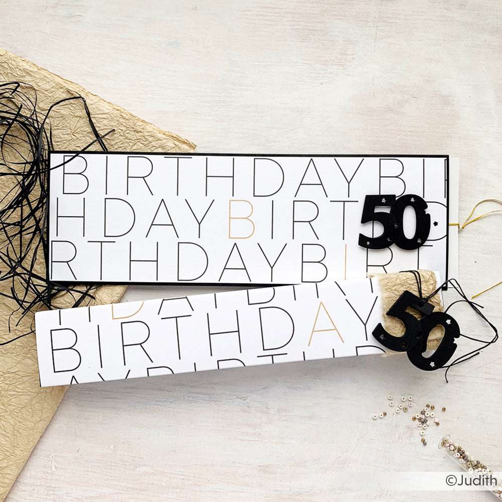 Zwei rechteckige Geburtstagskarten von Alexandra Renke mit BIRTHDAY Text und schwarzen 50 Ausschnitten auf weißem Hintergrund - ideal für Ihre nächsten Papierprojekte.