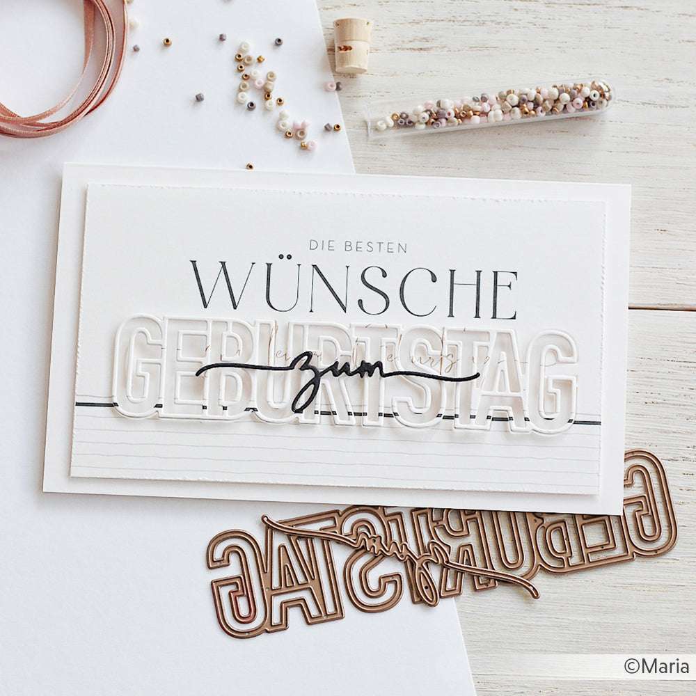 Handgefertigte Geburtstagskarte von Alexandra Renke aus Deutschland, die mit dekorativen Perlen, Bändern, Designpapier und Metallstempeln auf einer weißen Oberfläche hergestellt wurde.