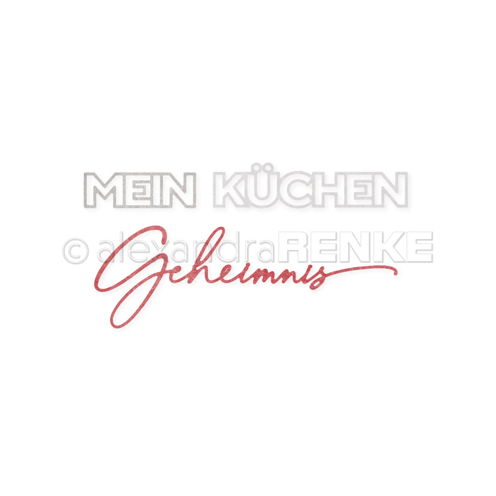 Der Text MEIN KÜCHEN Geheimnis in grauer und roter Schrift auf weißem Hintergrund von Alexandra Renke ist ideal für die Motivstanze oder für Ihre kreativen DieCut Systeme Projekte.